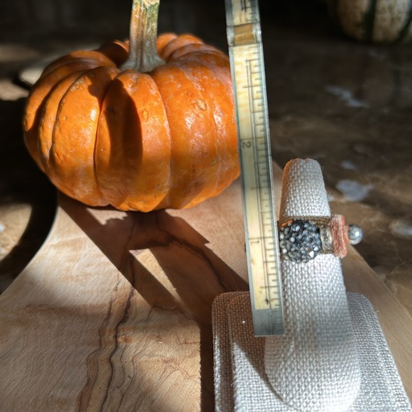 Leather ring w/ball of dark gray center crystals on a sterling silver pin. - Picture 2 of 5